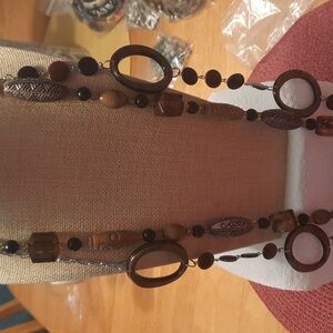 Womens wood and glass necklaces.